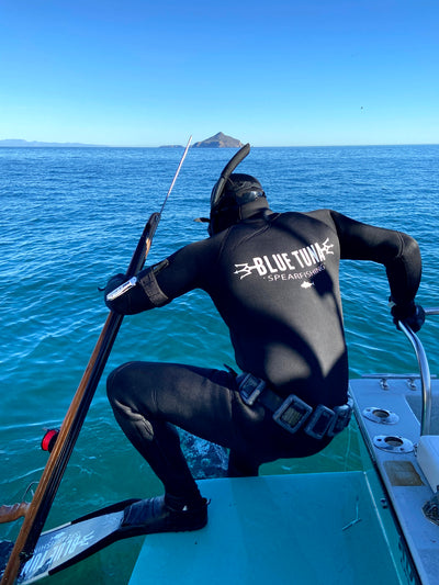 5mm Deep Black DualSport Wetsuit going in the ocean - Blue Tuna Spearfishing Co